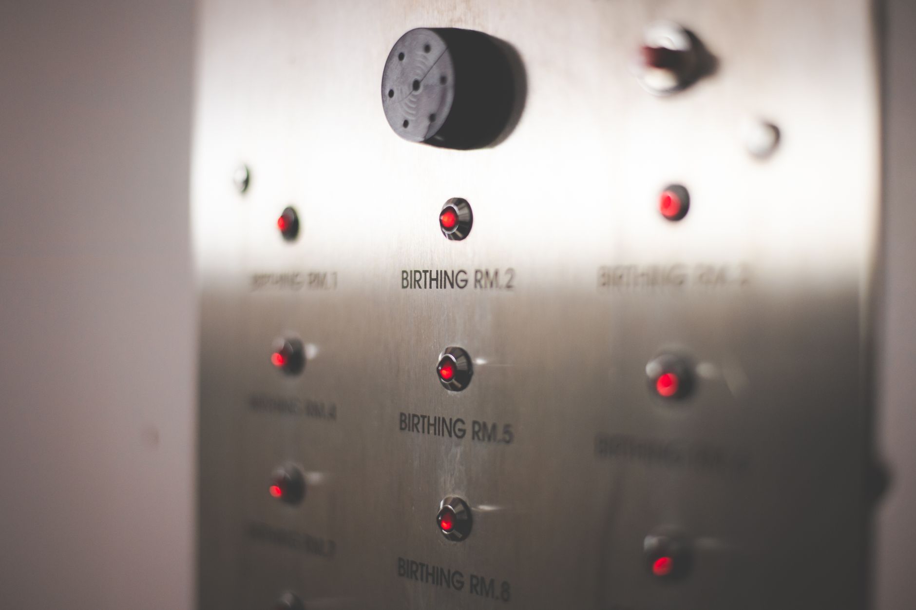 Hospital birthing room control panel with indicator lights and buttons